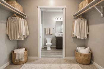Walk-in closet with ensuite bathroom connection